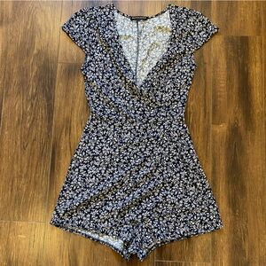 Brandy Melville navy floral romper size small short sleeve faux wrap